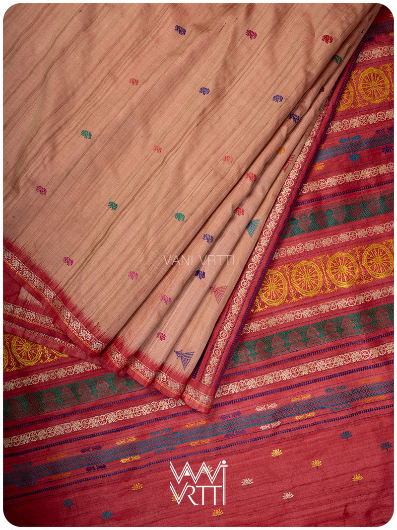 Peach red handspun tussar silk saree with Konark temple motifs and Airavata border in full view