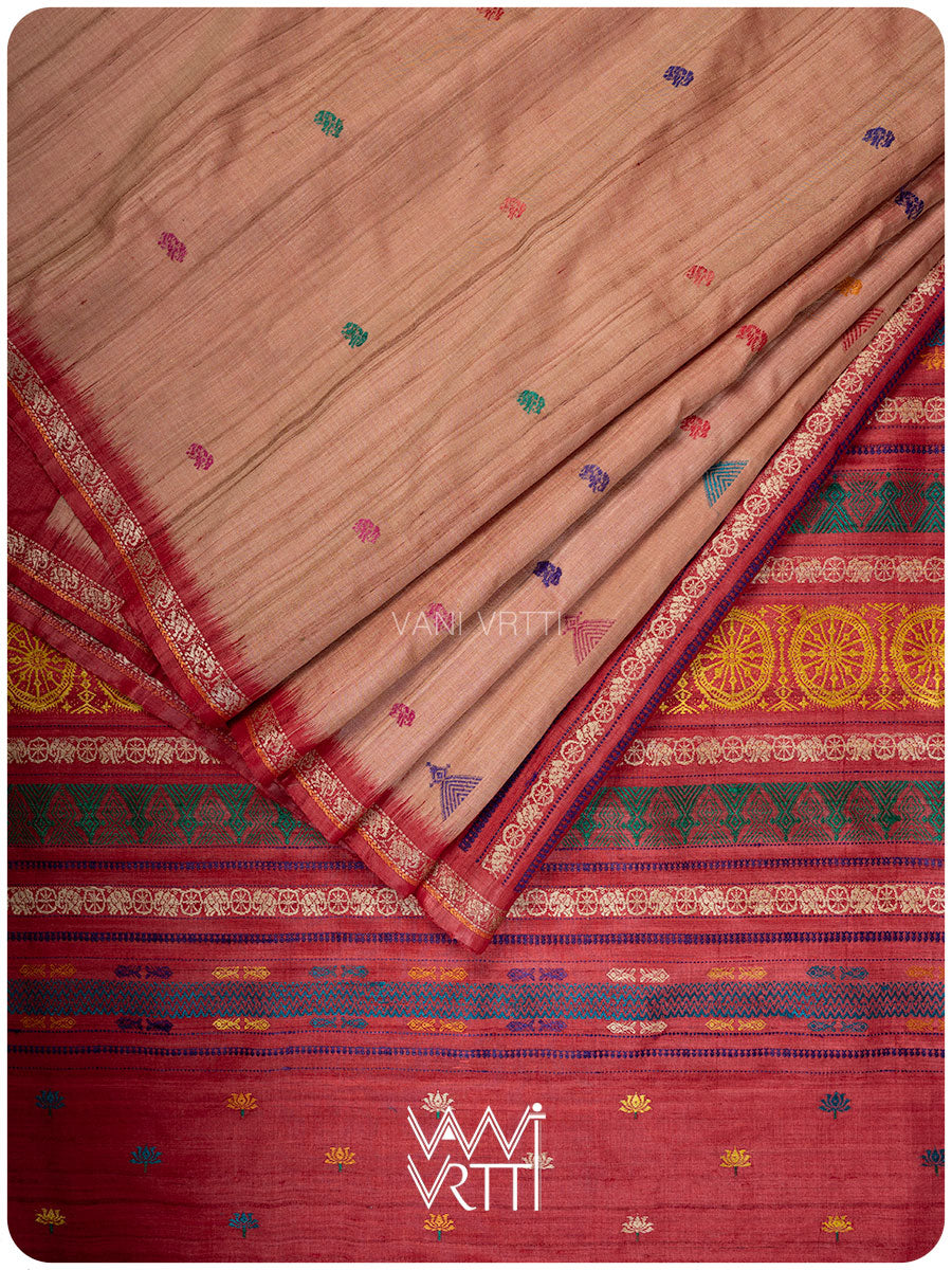Peach red handspun tussar silk Konark saree folded