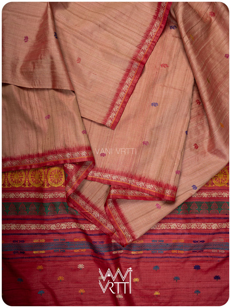 Ikat border close up on peach red tussar silk saree with Konark design