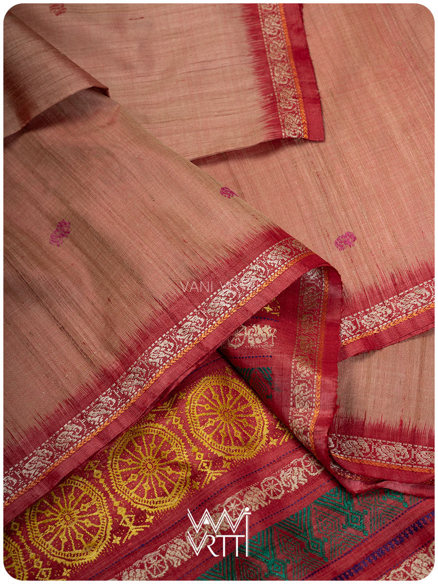 Handspun tussar silk texture detail in peach red with Konark weave