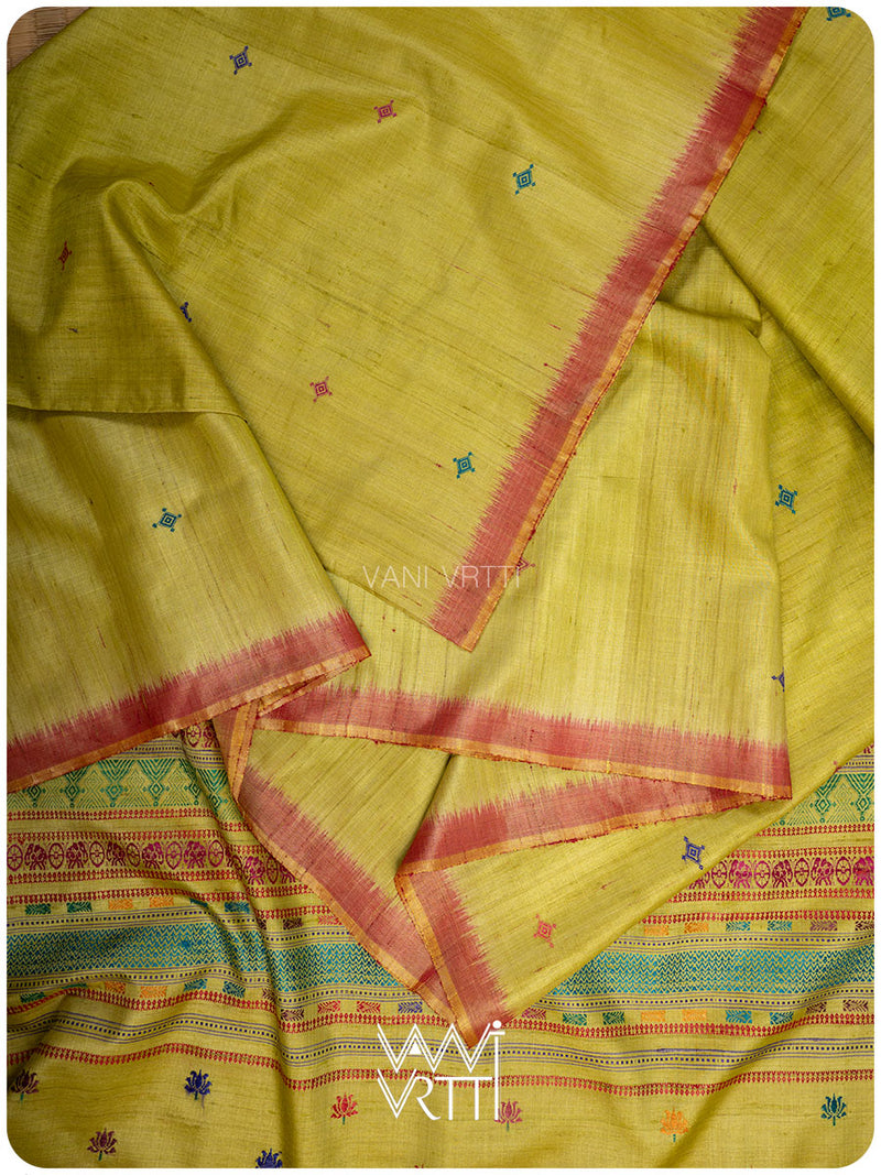 Ikat border close-up of Airavata elephant design on banana leaf green tussar silk
