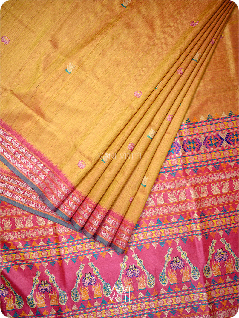 Yellow tussar silk saree with pink and multicolor border featuring elephant designs