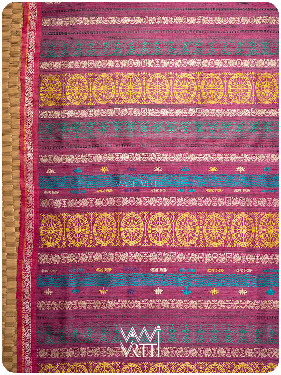 Pallu detail showing handwoven lotus flowers on slate grey tussar silk