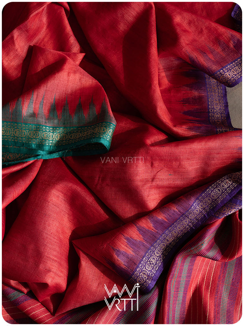 Dobby texture close up on red, purple, and green tussar silk saree body