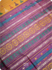 Close up of pallu with handwoven lotus flowers in pink, purple, and gold on tussar silk