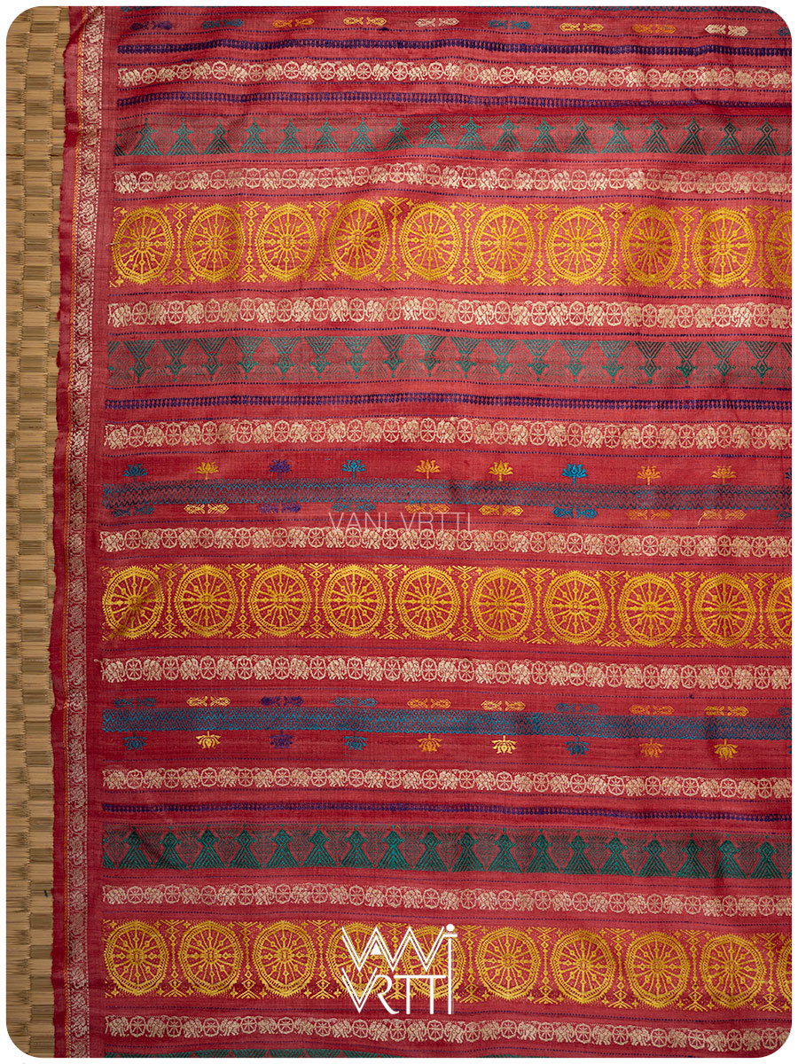 Pallu of peach red saree featuring handwoven lotus flowers and Airavata elephant border