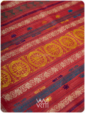 Pallu close up showing handpicked lotus flowers in multiple colors on peach red tussar