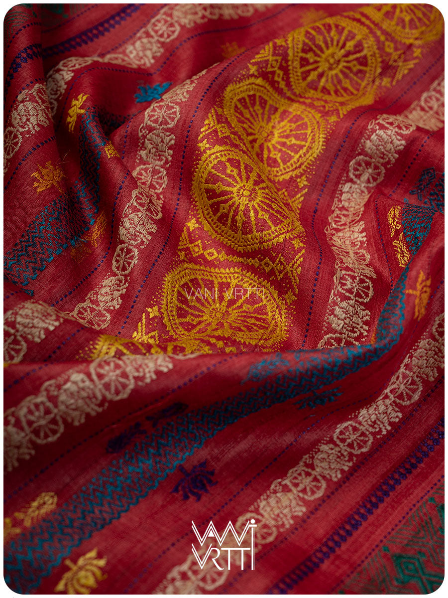 Konark temple motif close up on peach red handspun tussar silk