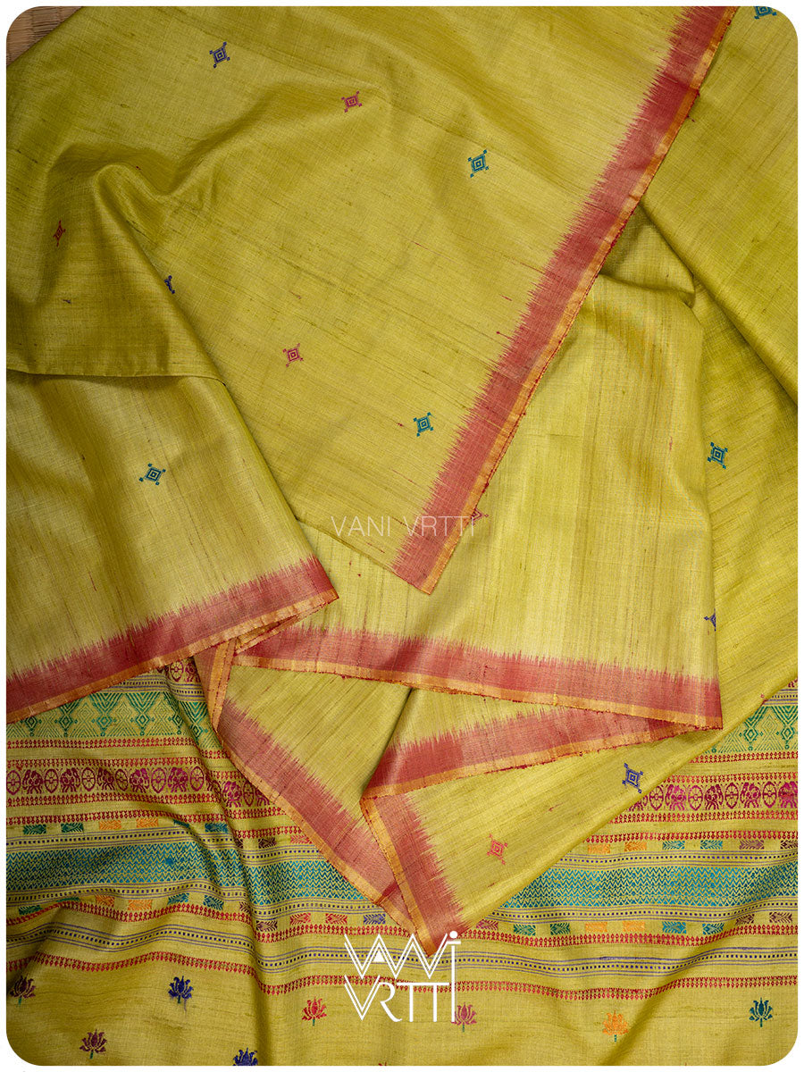 Ikat border close-up of Airavata elephant design on banana leaf green tussar silk