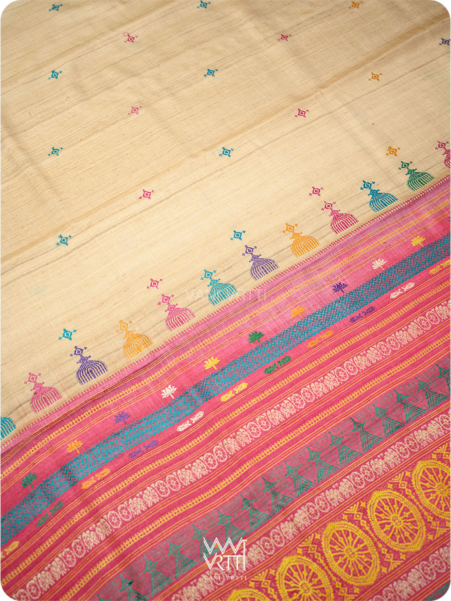 Close-up of handspun tussar silk texture in pink with Konark design details
