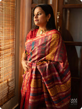 Body detail of slate black tussar silk saree with handwoven lotus flowers and Airavata motifs