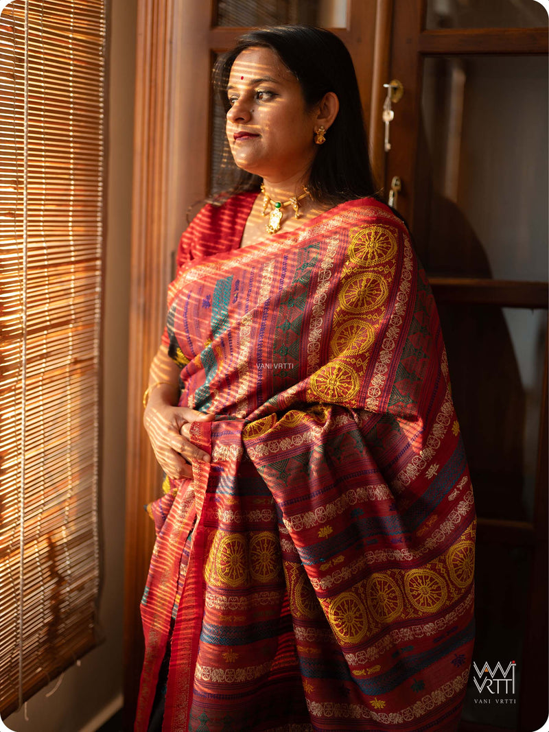 Body detail of slate black tussar silk saree with handwoven lotus flowers and Airavata motifs