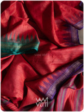 Dobby texture close up on red, purple, and green tussar silk saree body