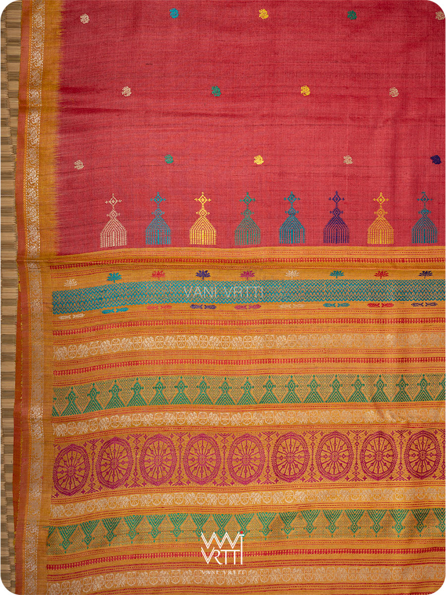 Body close up of red and mustard tussar silk saree with Konark Sun Temple inspired motifs