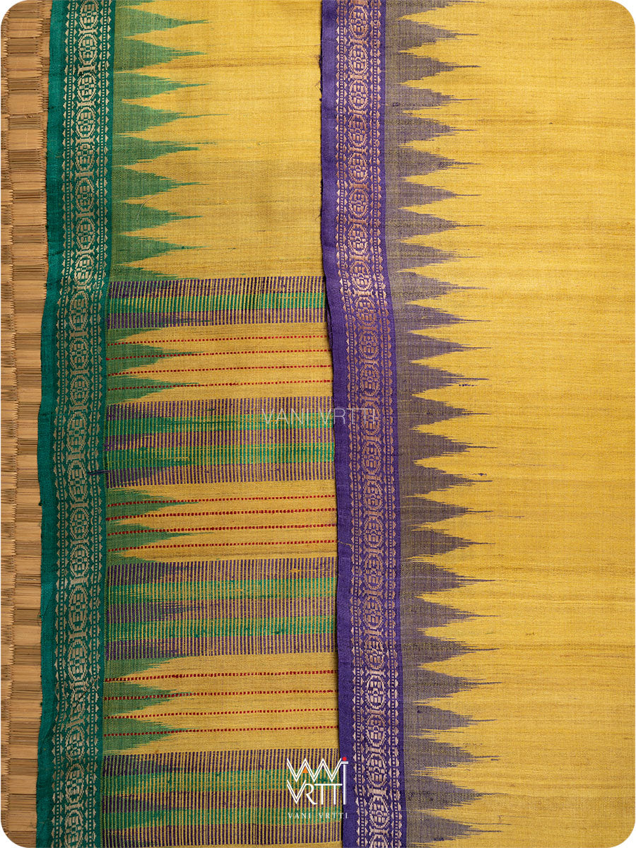 Ikat temple motifs on borders of Aarush saree in yellow, purple, and green tussar